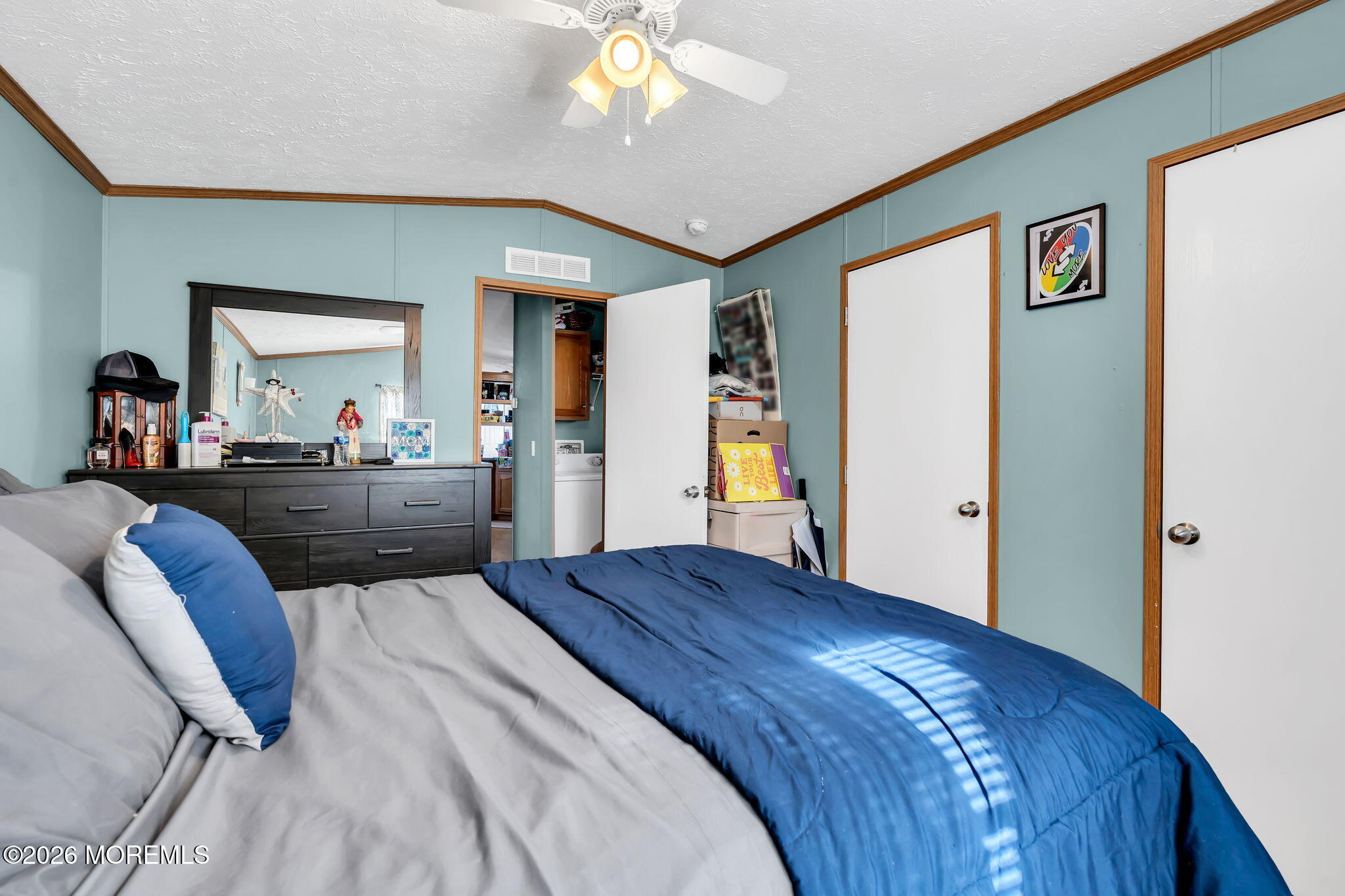 12 Locust Grove Hazlet, NJ 07730 - Photo 8 of 14 a bedroom with a bed and a large mirror