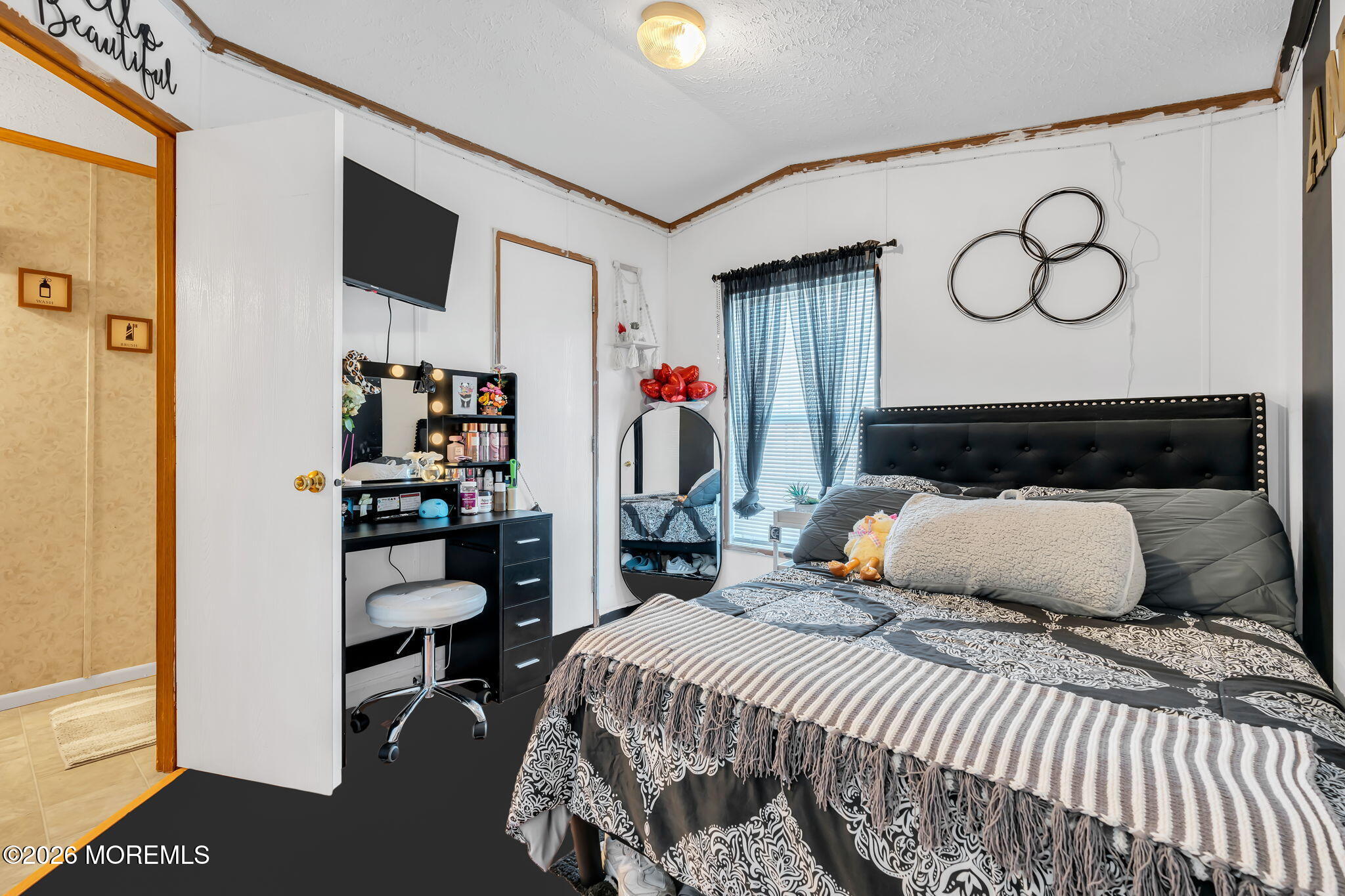 12 Locust Grove Hazlet, NJ 07730 - Photo 10 of 14 a bedroom with a bed and a window