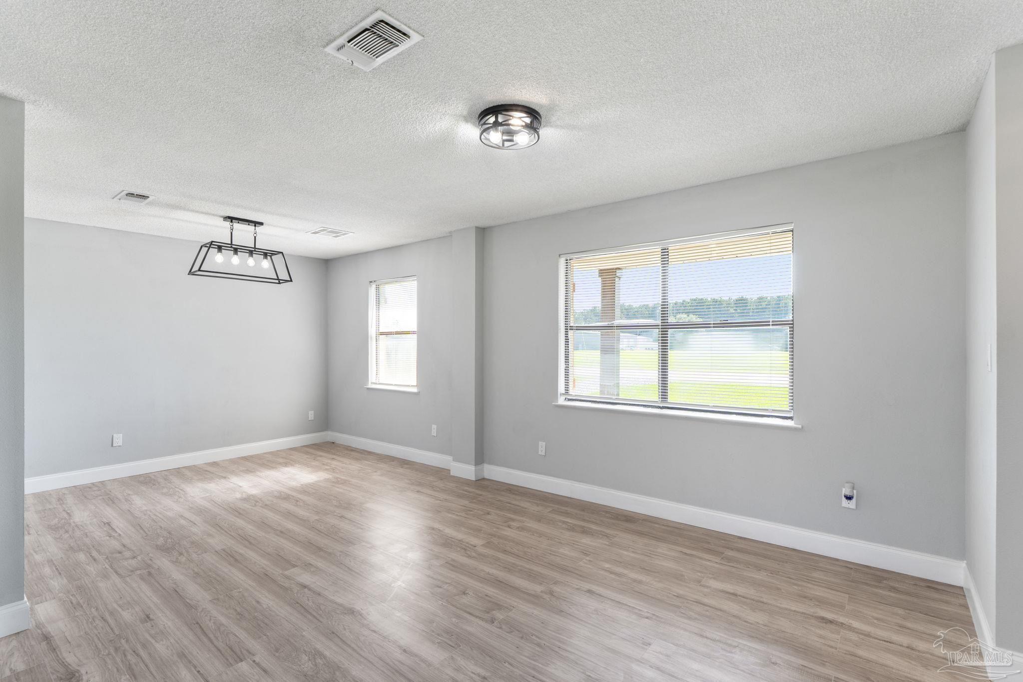 2501 Argle Road Cantonment, FL 32533 - Photo 14 of 36 an empty room with windows