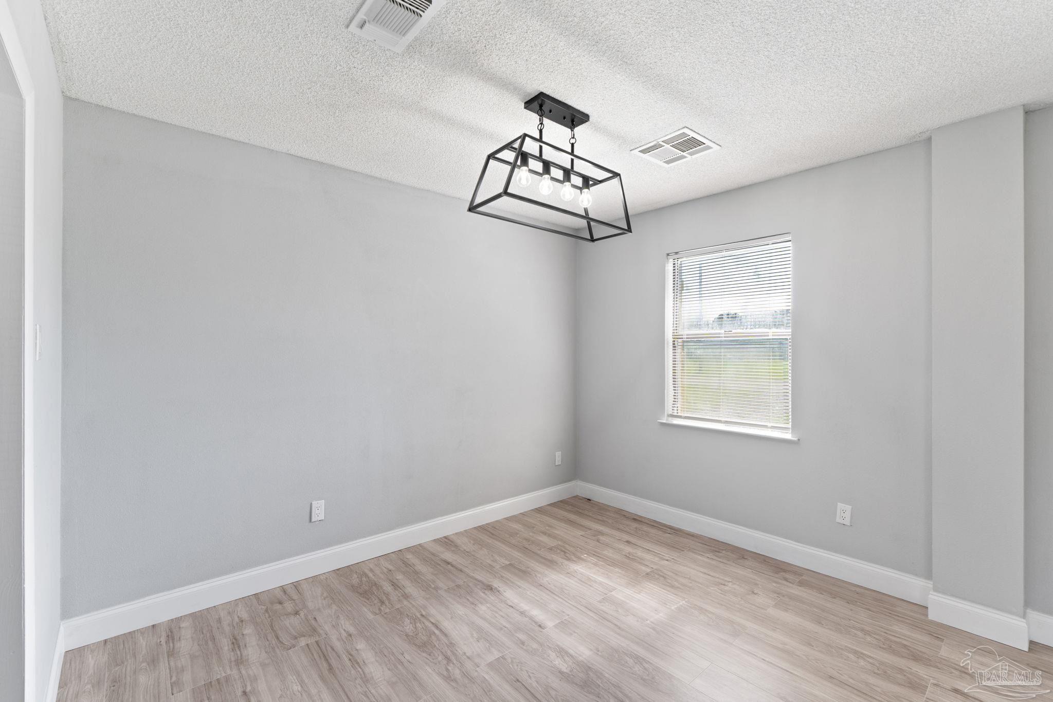 2501 Argle Road Cantonment, FL 32533 - Photo 16 of 36 an empty room with a window
