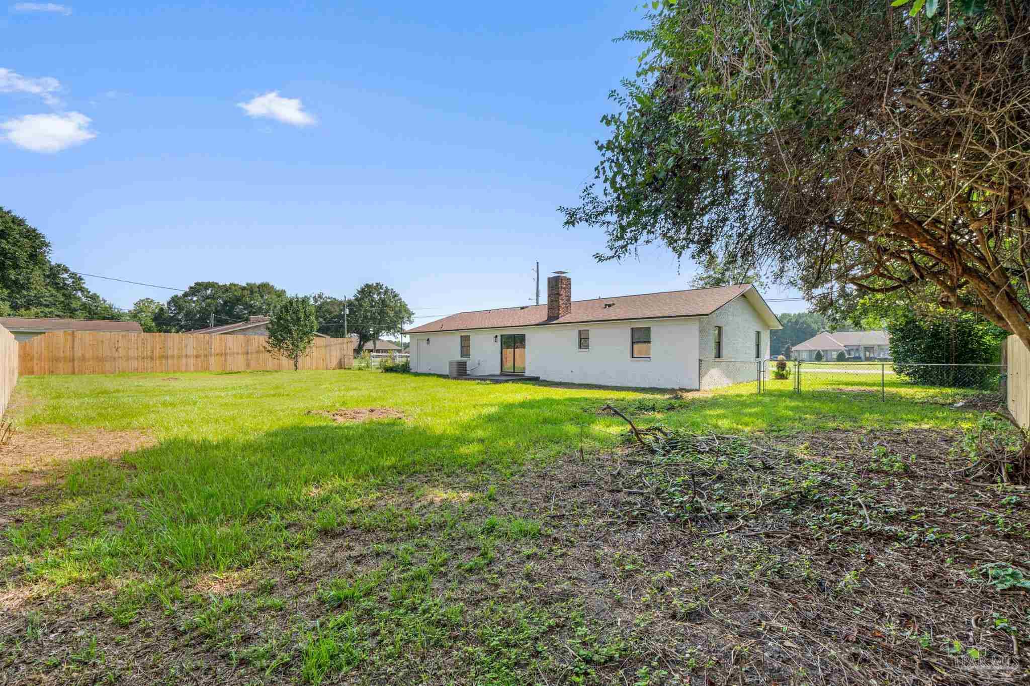 2501 Argle Road Cantonment, FL 32533 - Photo 36 of 36 a front view of a house with garden