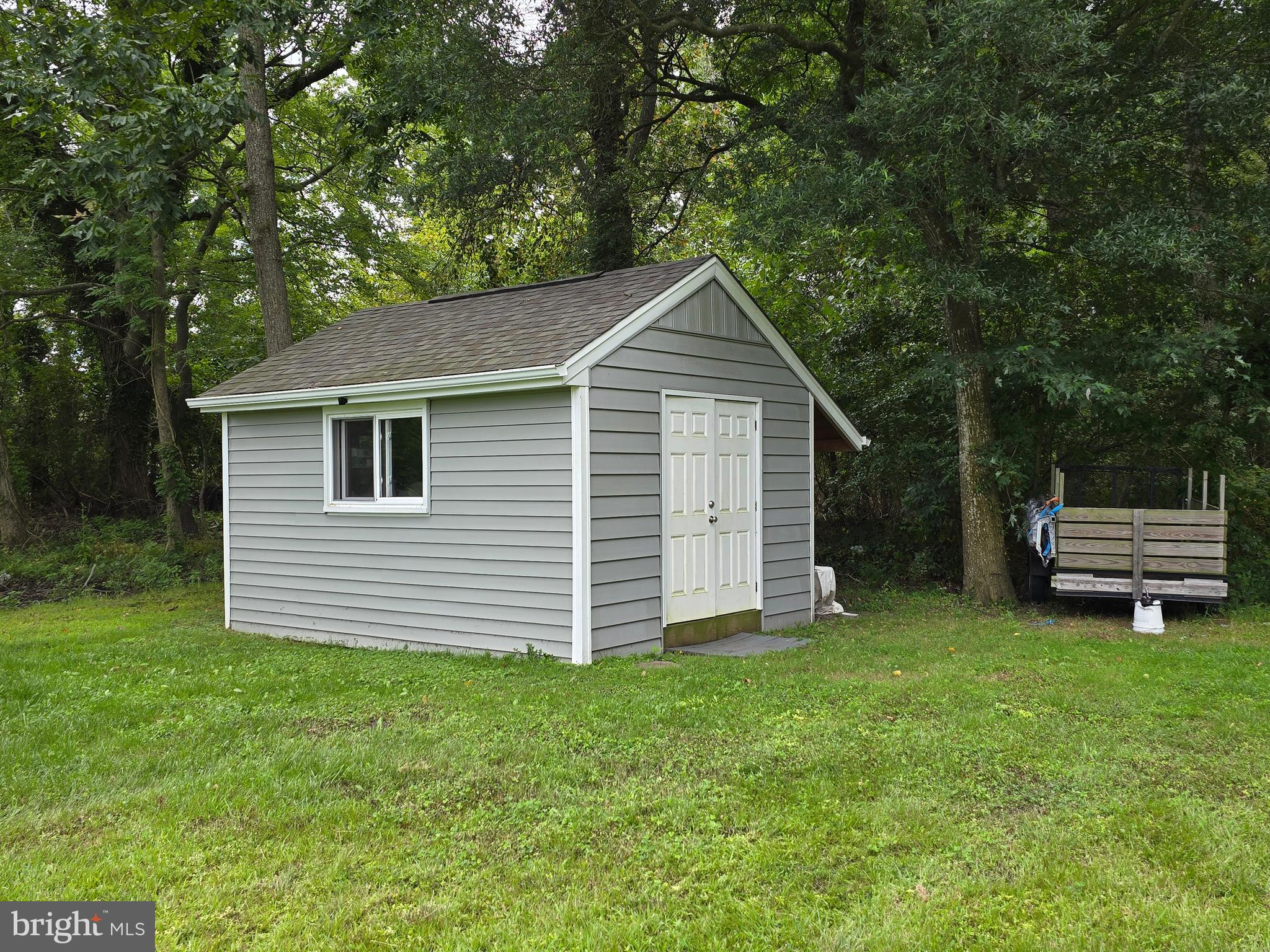 3592 Freedomtown Road Crisfield, MD 21817 - Photo 5 of 22 a view of a house with a yard