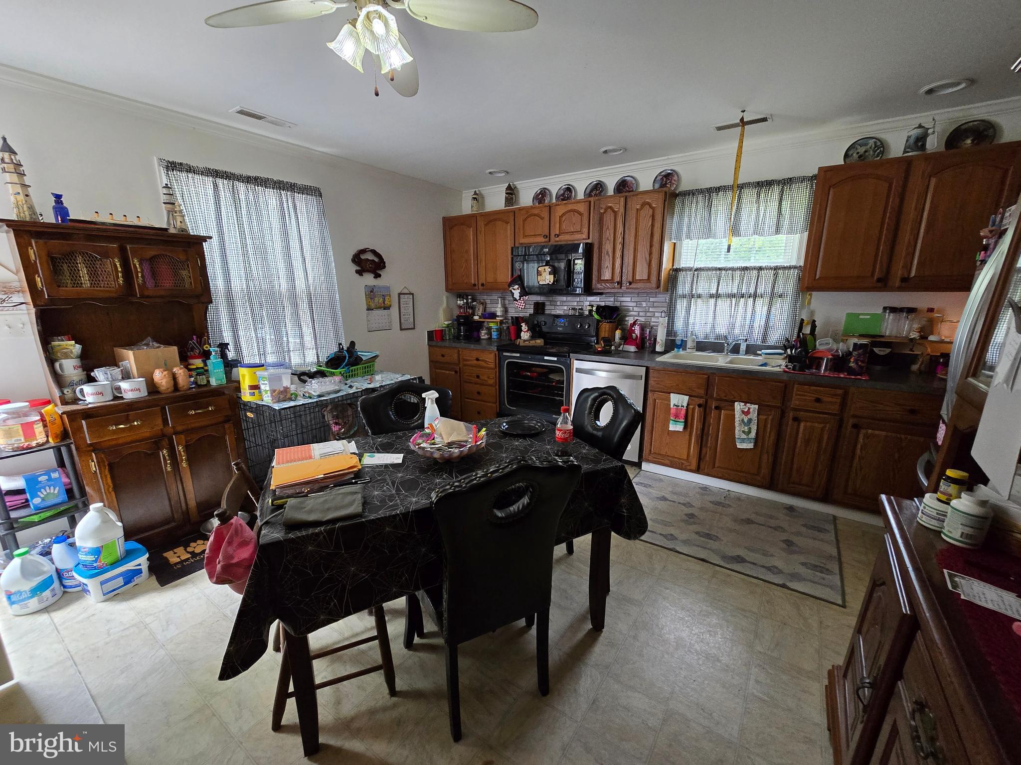 3592 Freedomtown Road Crisfield, MD 21817 - Photo 7 of 22 a view of a workspace with furniture and a window