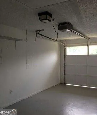 a view of a room with an empty space