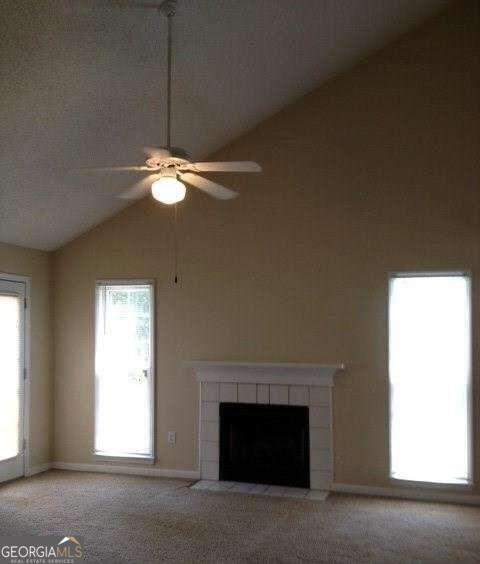 132 Warren Way Athens, GA 30605 - Photo 2 of 13 a living room with a fireplace and a window
