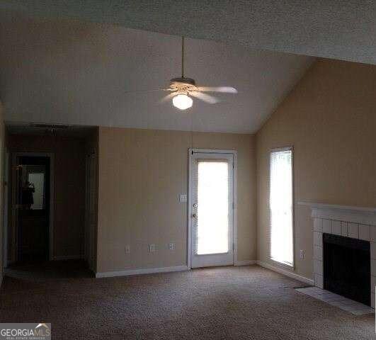 132 Warren Way Athens, GA 30605 - Photo 3 of 13 an empty room with ceiling fan and window