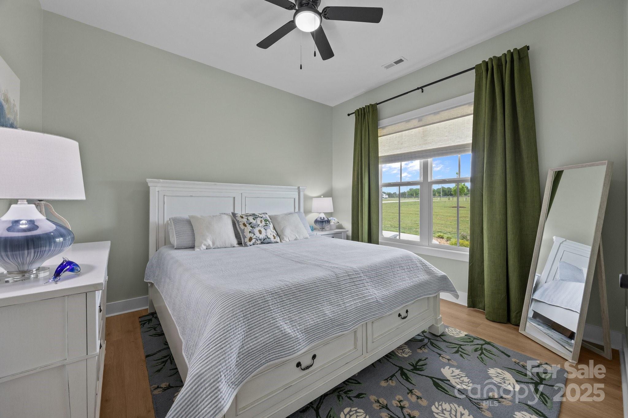 4316 Nesbit Road Monroe, NC 28112 - Photo 18 of 33 a bedroom with a bed and a large window