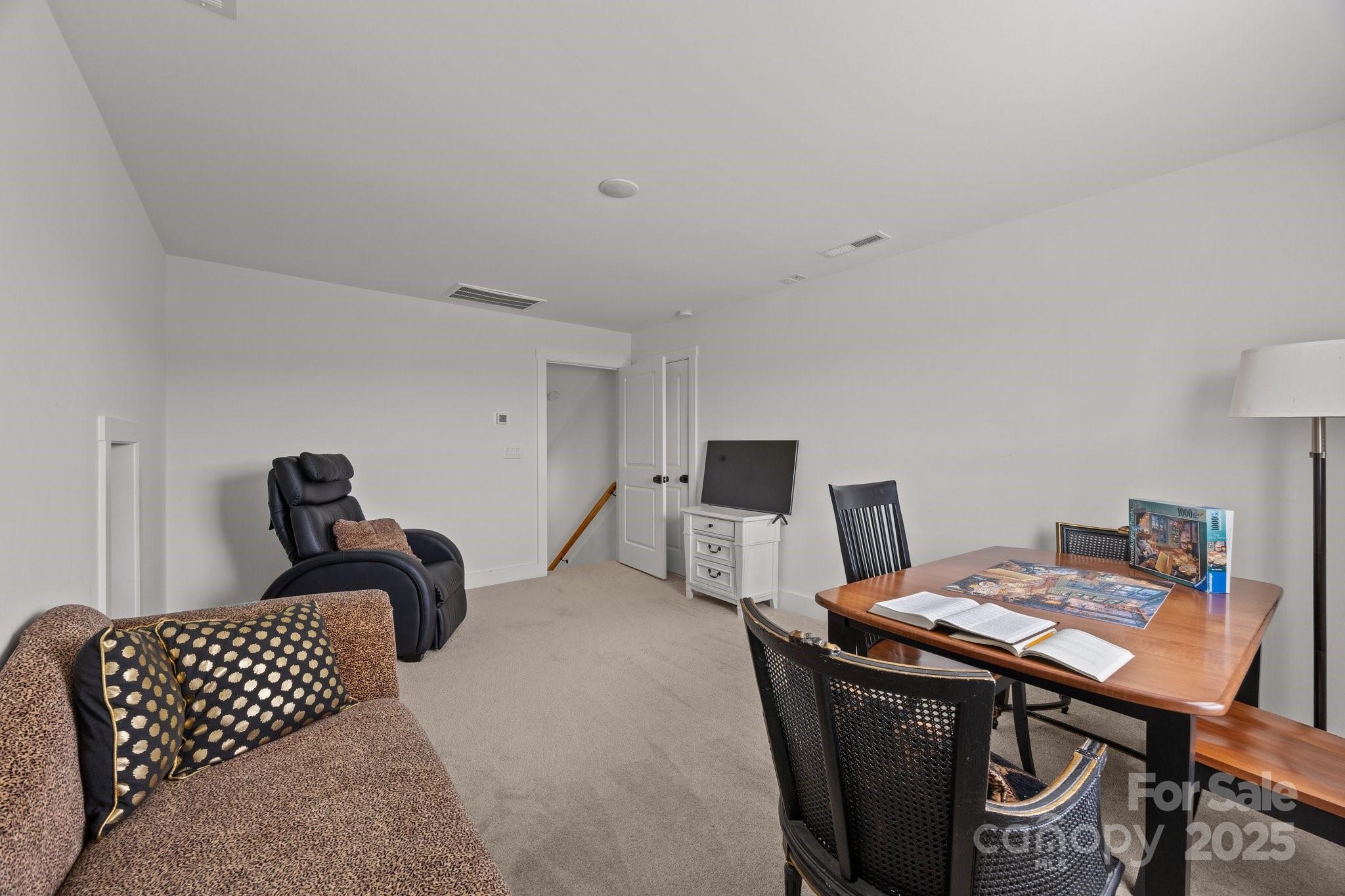 4316 Nesbit Road Monroe, NC 28112 - Photo 21 of 33 a bedroom with furniture and a wooden floor