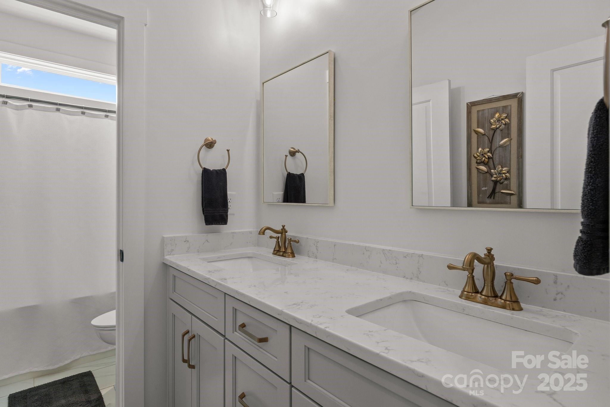 4316 Nesbit Road Monroe, NC 28112 - Photo 22 of 33 a bathroom with a sink and a mirror
