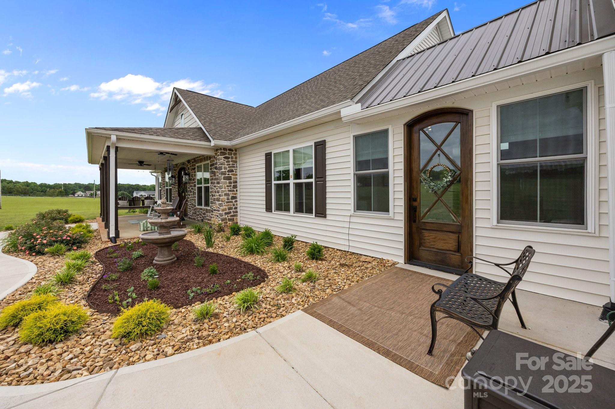 4316 Nesbit Road Monroe, NC 28112 - Photo 3 of 33 a front view of a house with garden