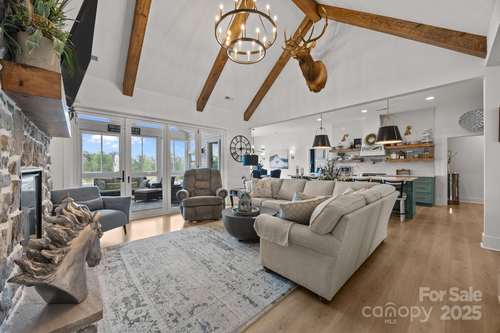 4316 Nesbit Road Monroe, NC 28112 - Photo 6 of 33 a living room with furniture kitchen view and a wooden floor