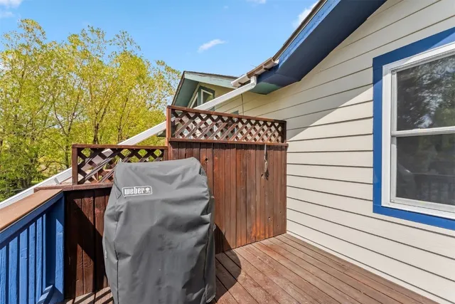 a view of balcony with furniture