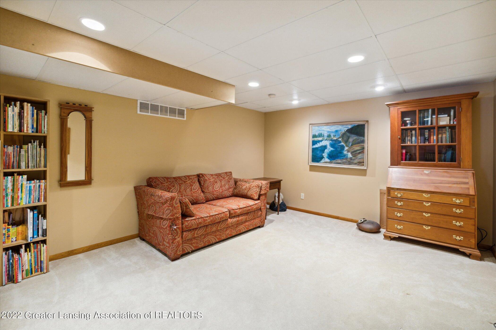 2100 Holt Road Williamston, MI 48895 - Photo 31 of 53 Lower Level Family Room