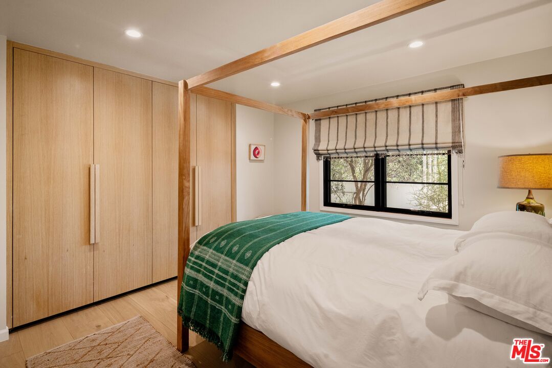 29500 Heathercliff Road, Unit 138 Malibu, CA 90265 - Photo 11 of 20 a bedroom with a large bed and a window