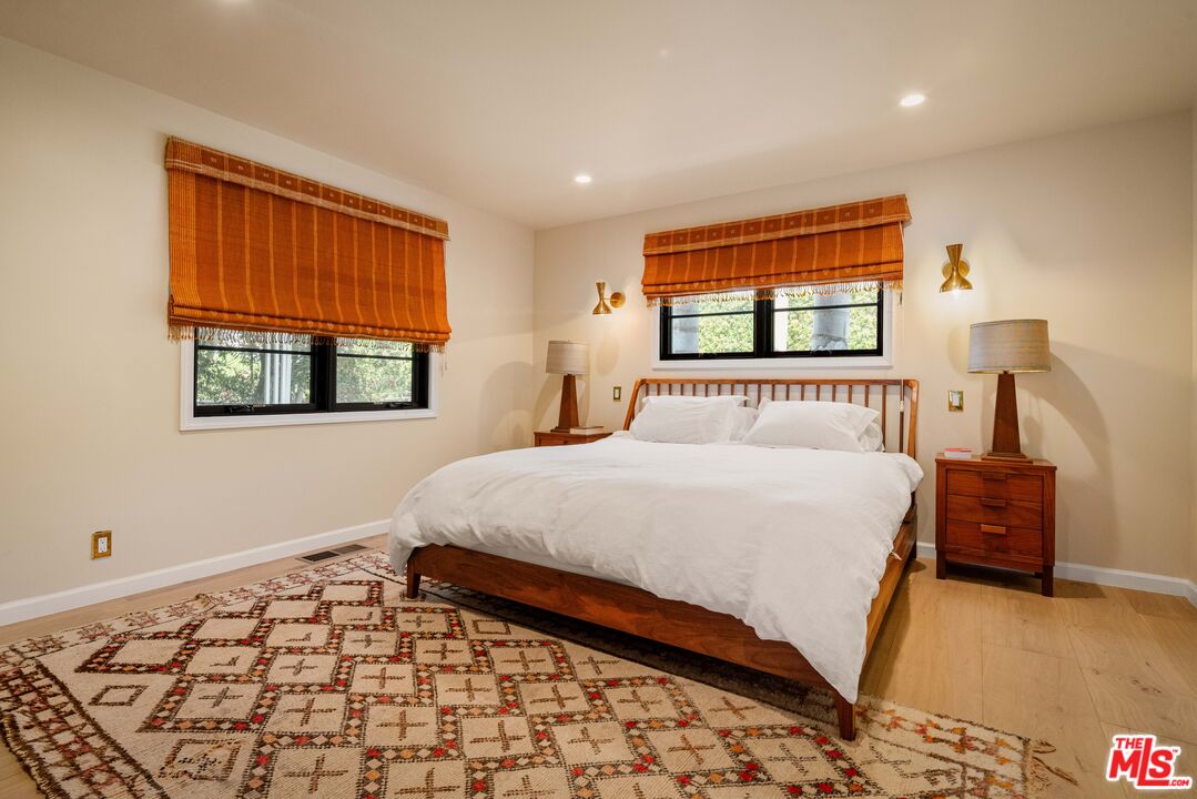 29500 Heathercliff Road, Unit 138 Malibu, CA 90265 - Photo 7 of 20 a bedroom with a bed and a window