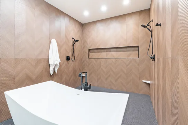 a bathroom with a sink and mirror