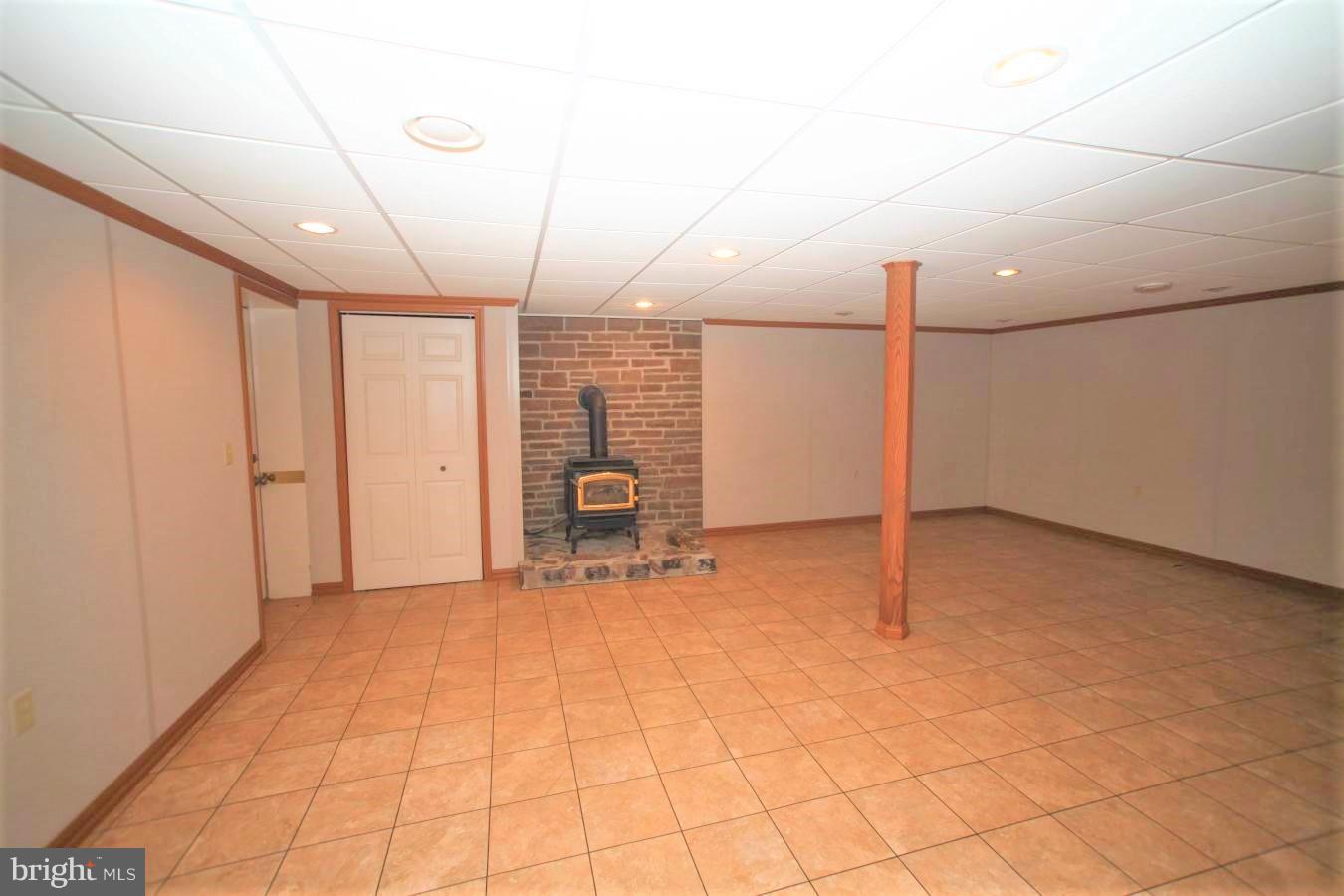 8639 Maple Grove Road Spring Grove, PA 17362 - Photo 35 of 61 Gas Fireplace in Basement Family Room
