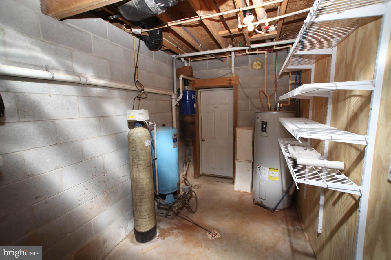 8639 Maple Grove Road Spring Grove, PA 17362 - Photo 41 of 61 Well Pump, Softener and HW tank
