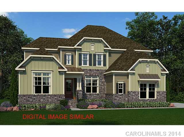 657 Chase Court, Unit 101 Fort Mill, SC 29708 - Photo 1 of 1 a front view of a house with a yard