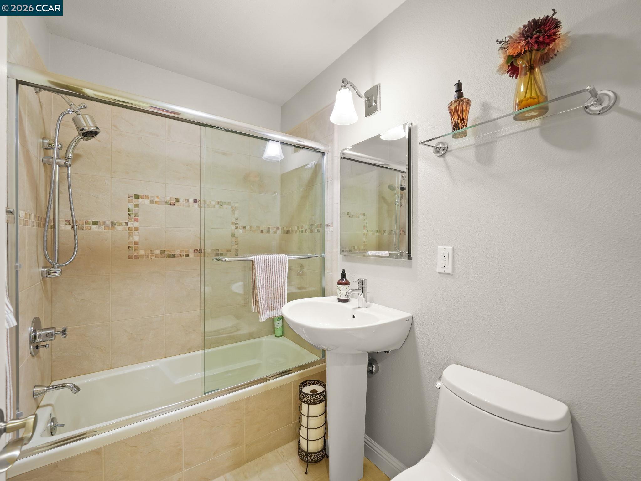 5900 High Street Clayton, CA 94517 - Photo 19 of 46 a bathroom with a sink a toilet and shower