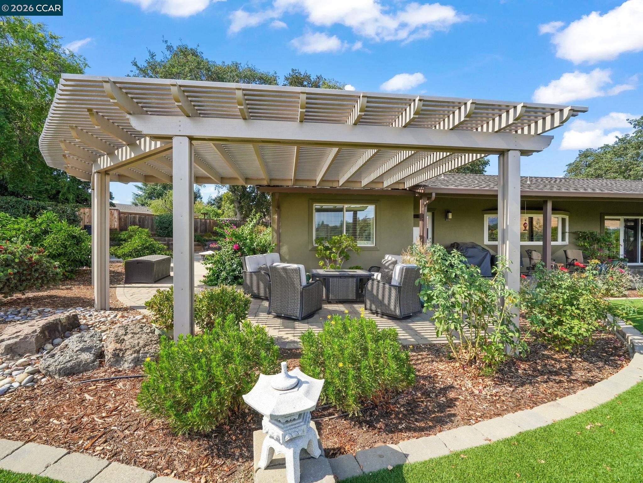 5900 High Street Clayton, CA 94517 - Photo 32 of 46 a view of a chairs and table in patio with a fire pit