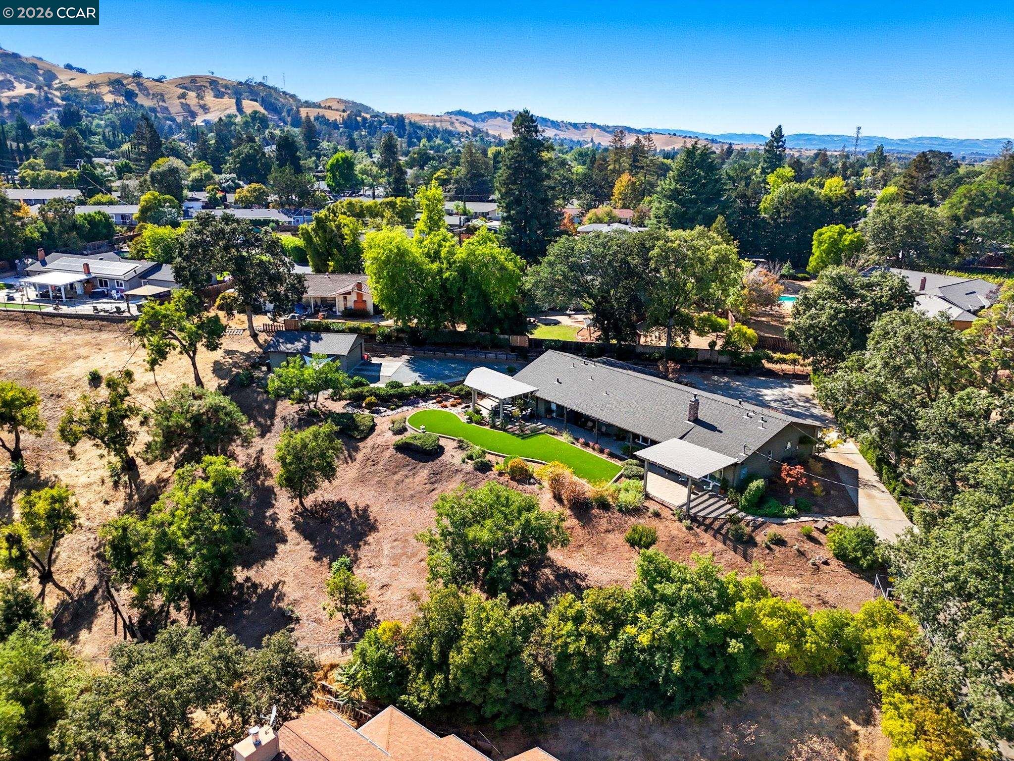 5900 High Street Clayton, CA 94517 - Photo 42 of 46 an aerial view of a house with a garden