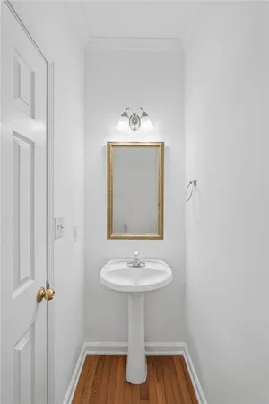 a bathroom with a sink and mirror