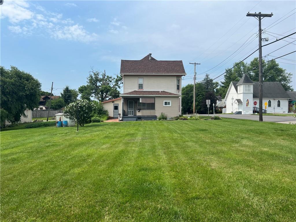 802 4th Street Rochester, PA 15074 - Photo 29 of 31 a view of a house with a big yard and large trees