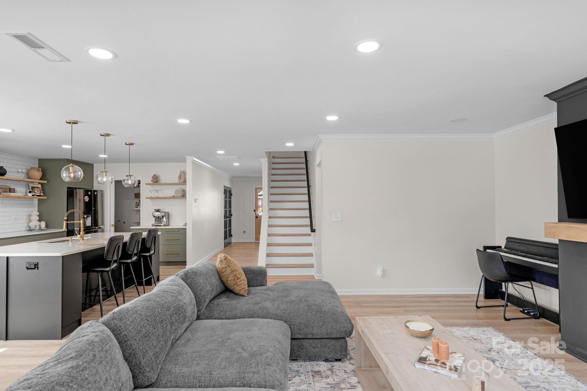 12847 Connemara Court Midland, NC 28107 - Photo 15 of 47 a living room with furniture and a piano