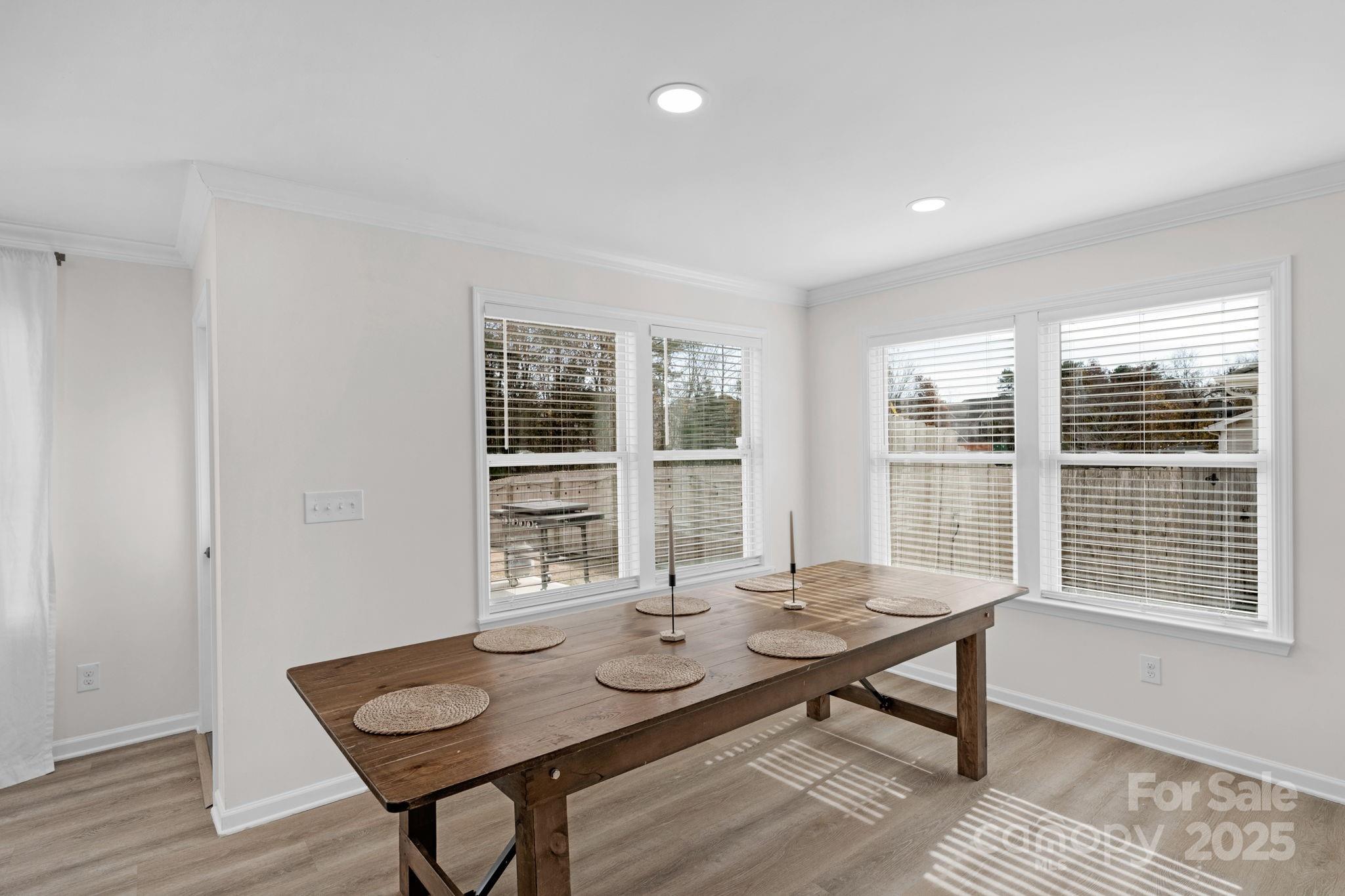 12847 Connemara Court Midland, NC 28107 - Photo 21 of 47 a view of a dining room with furniture window and outside view