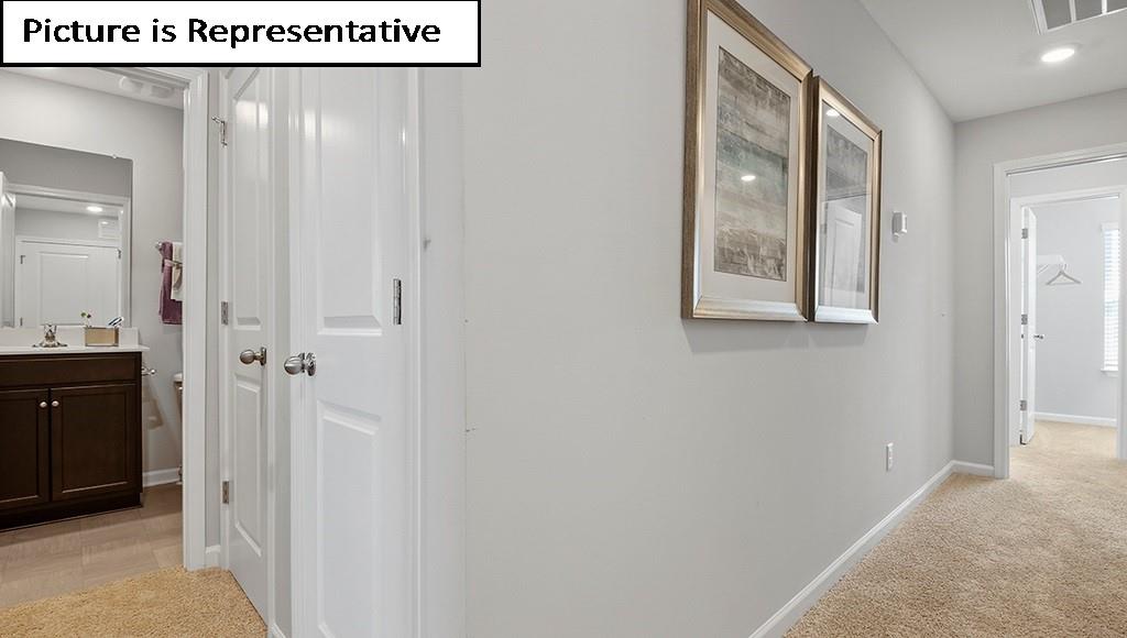 7012 North Mill Road Charlotte, NC 28216 - Photo 13 of 26 a view of an entryway with wooden floor