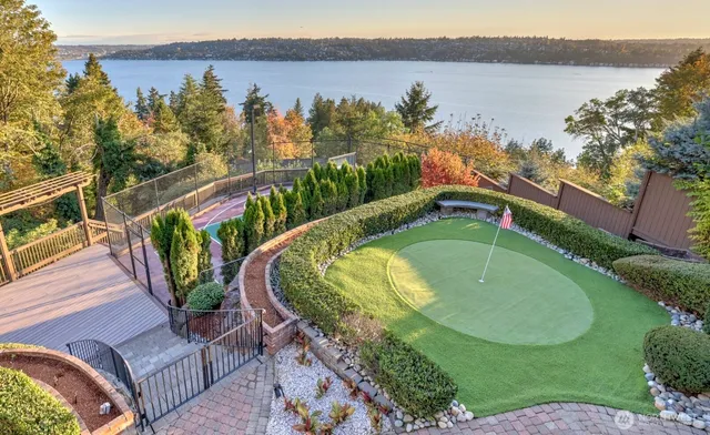a view of a swimming pool with a patio