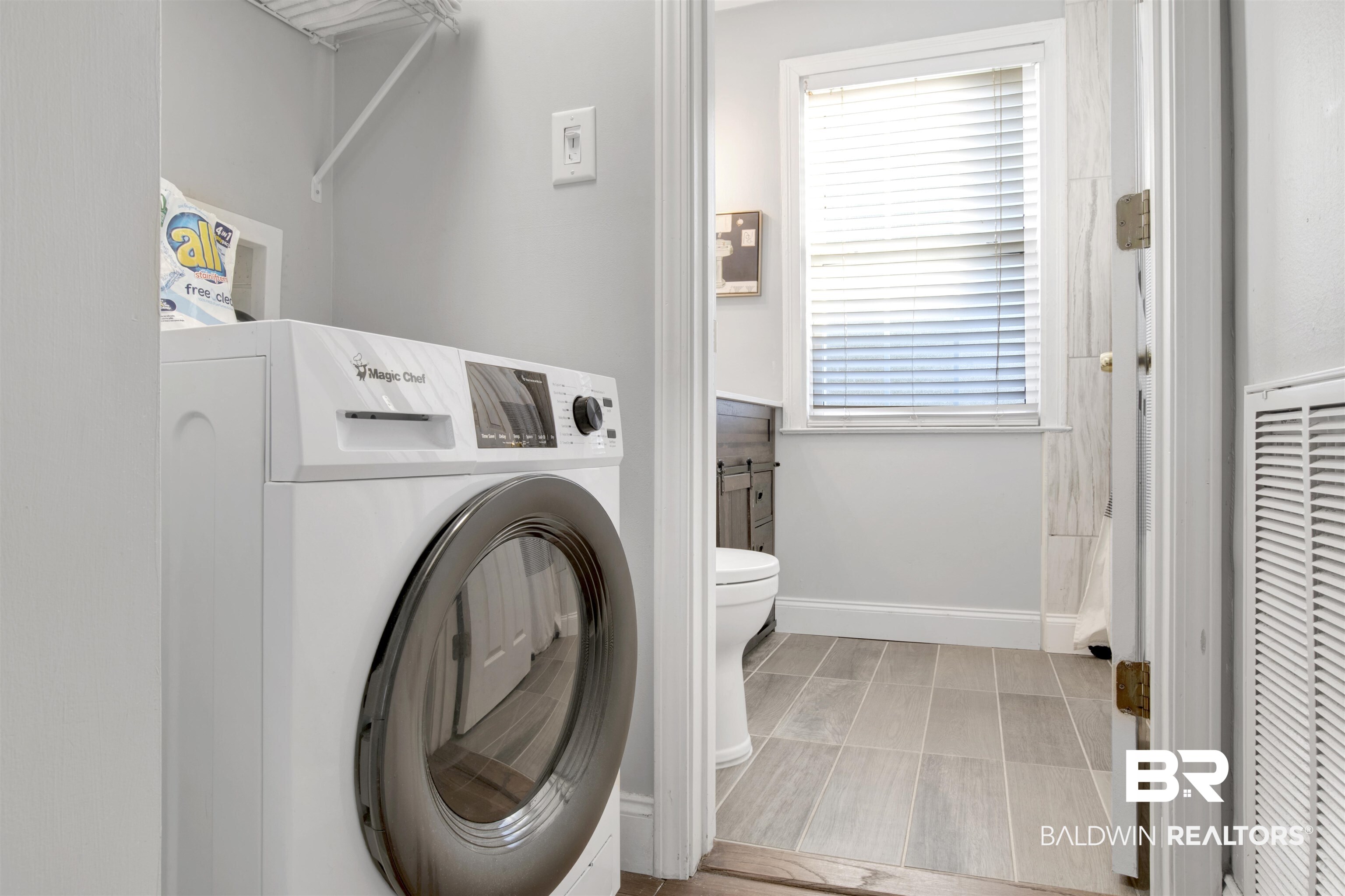 214 Upham Street, Unit 7A Mobile, AL 36607 - Photo 17 of 35 Washroom featuring washer / dryer and a heating unit