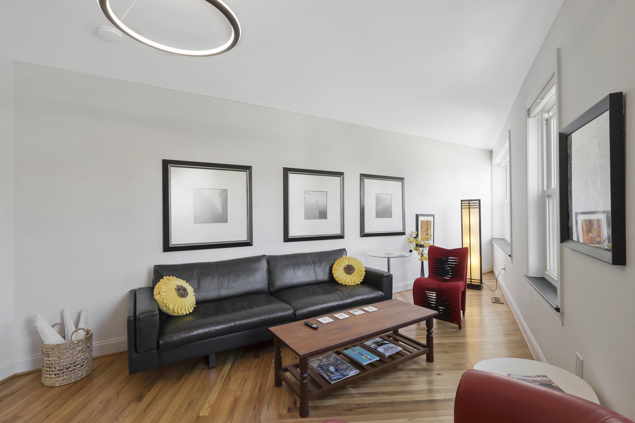 116 Commerce Street Alexandria, VA 22314 - Photo 7 of 50 Bright cozy family room with electric fireplace.