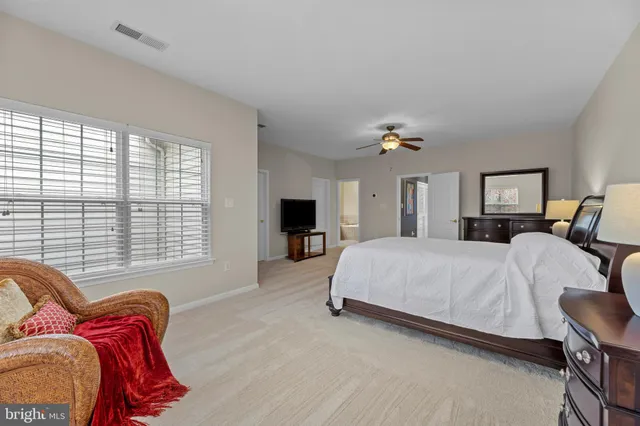 a bed room with a bed and a couch