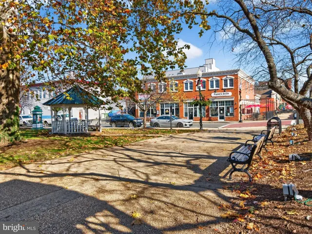 a view of a water fountain in front of the house