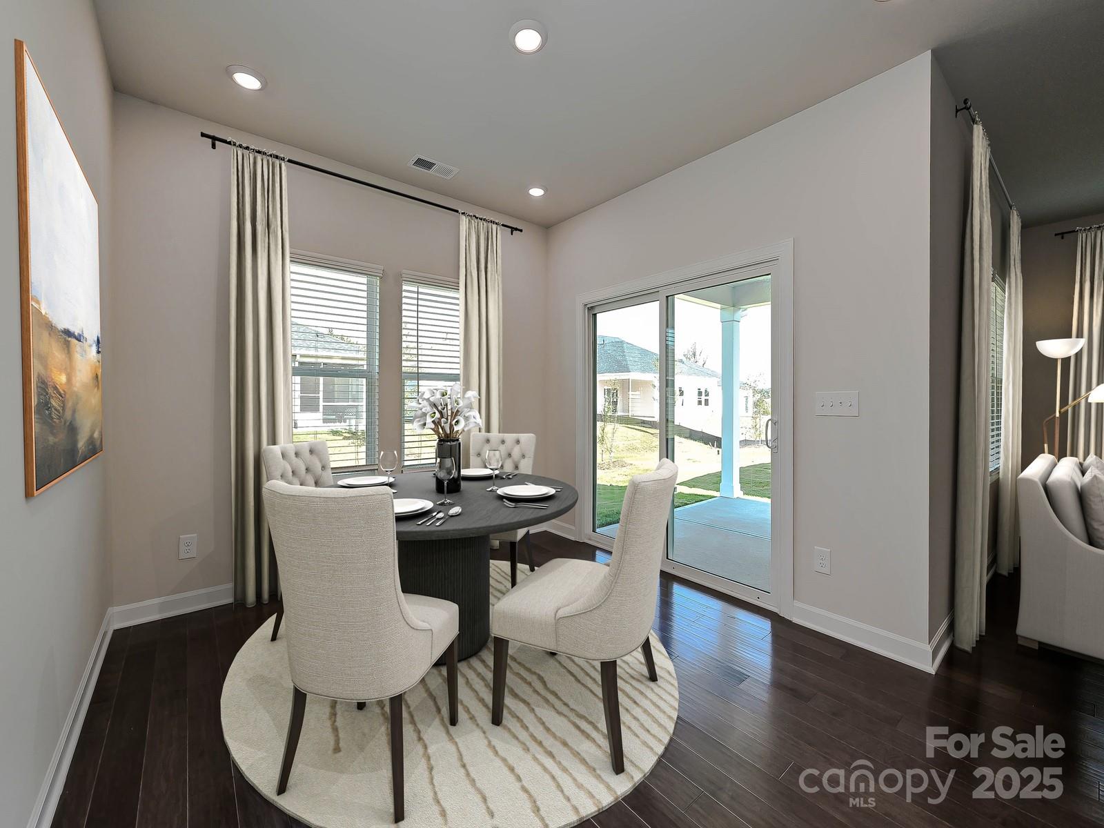 178 Nelson Crk Road Mocksville, NC 27028 - Photo 4 of 7 a view of a dining room with furniture window and wooden floor