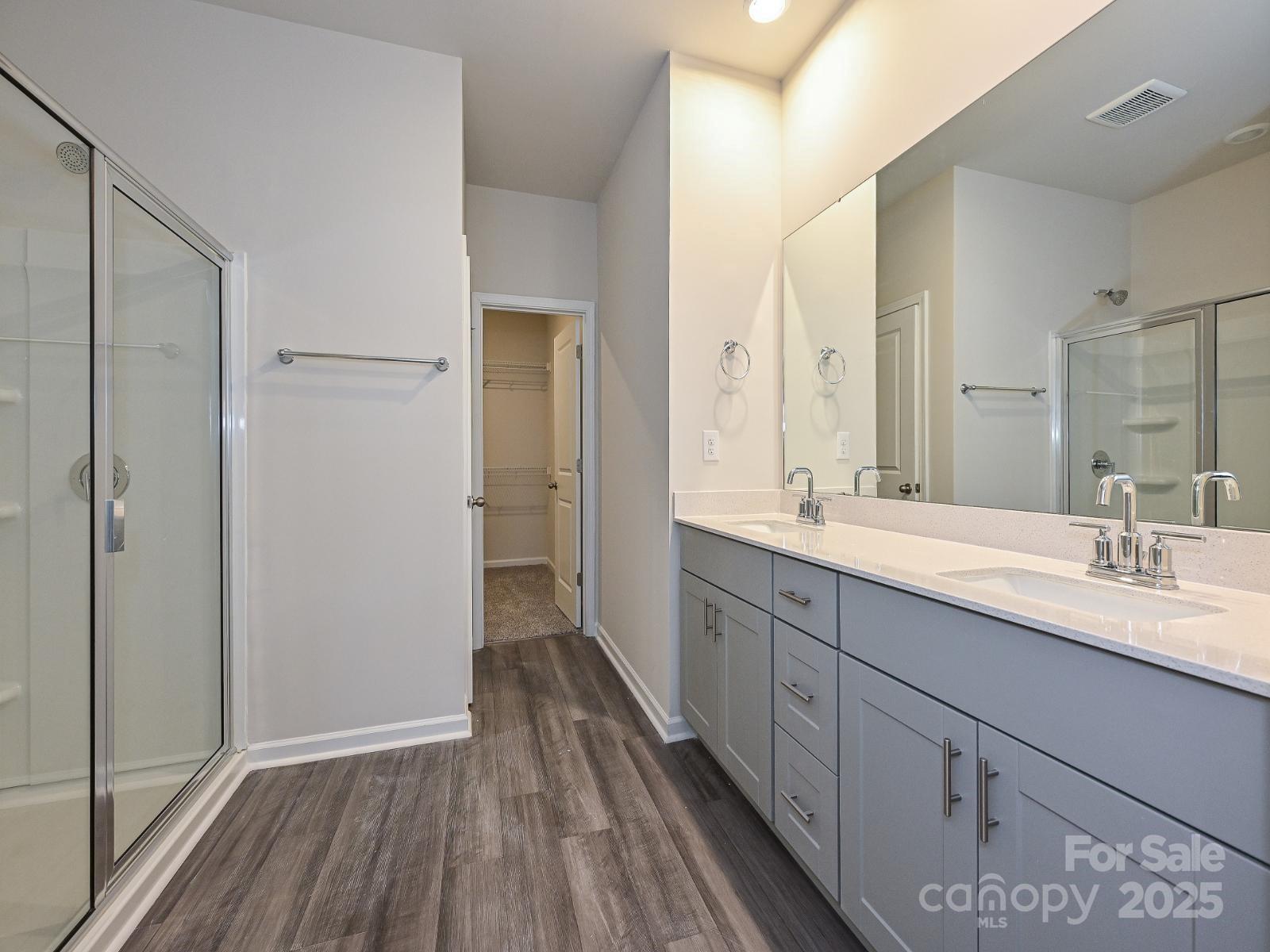 178 Nelson Crk Road Mocksville, NC 27028 - Photo 6 of 7 a spacious bathroom with a double vanity sink and mirror