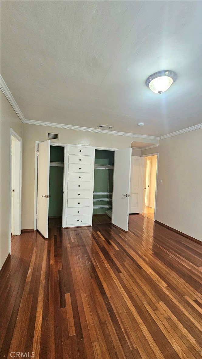1525 Bellwood Road San Marino, CA 91108 - Photo 22 of 25 an empty room with wooden floor and closet