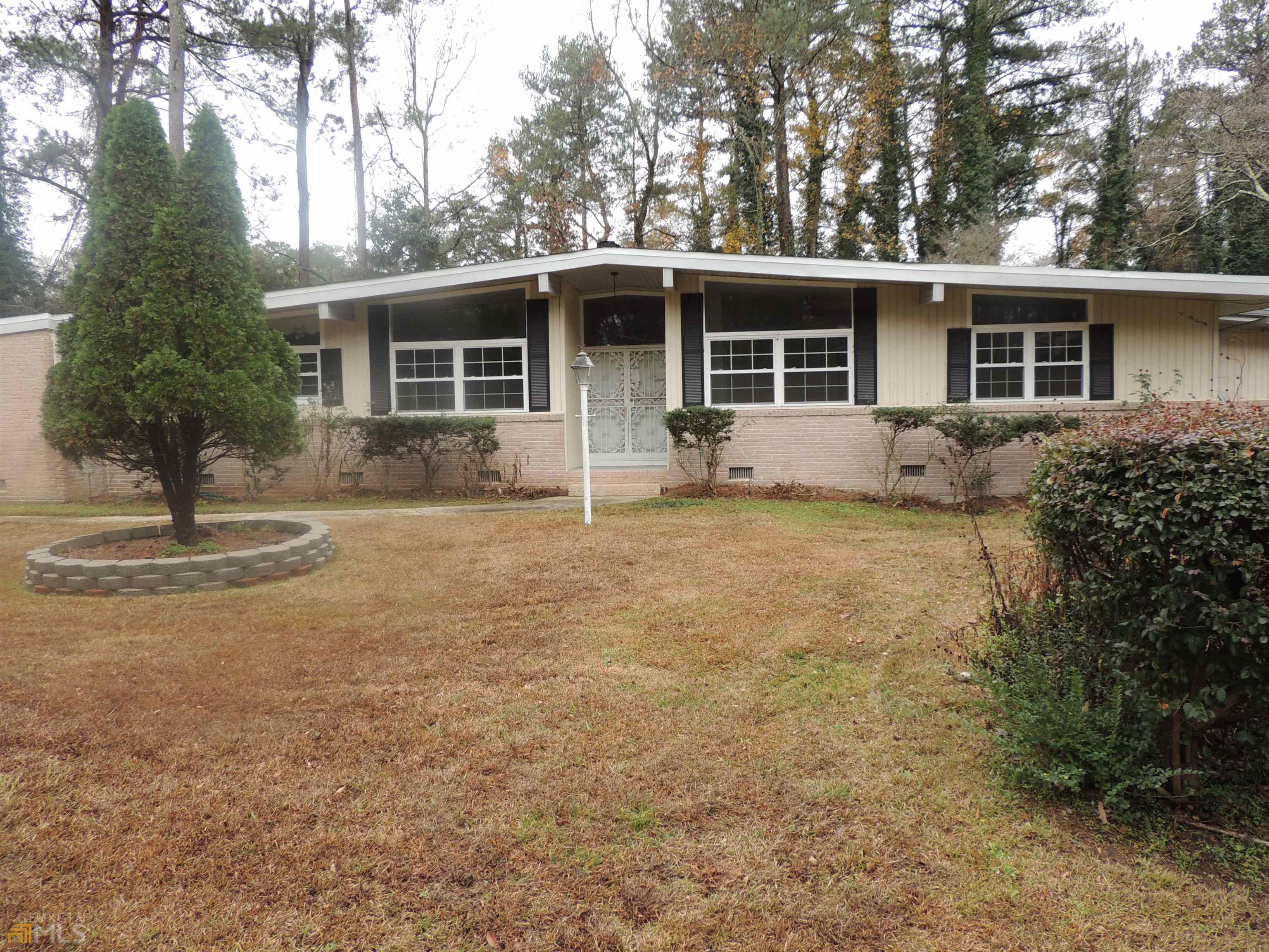 4139 Windsor Castle Way Decatur, GA 30034 - Photo 1 of 1 a front view of a house with garden