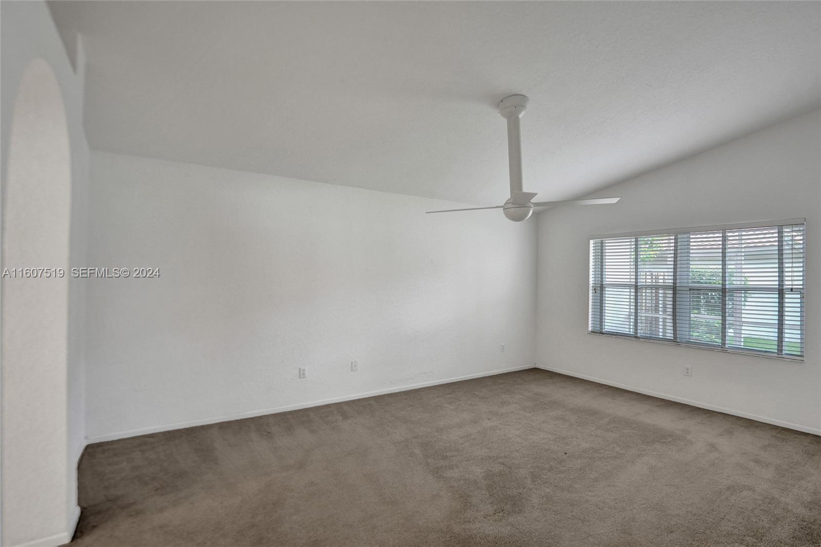 22740 Royal Crown Terrace East Boca Raton, FL 33433 - Photo 15 of 26 an empty room with windows