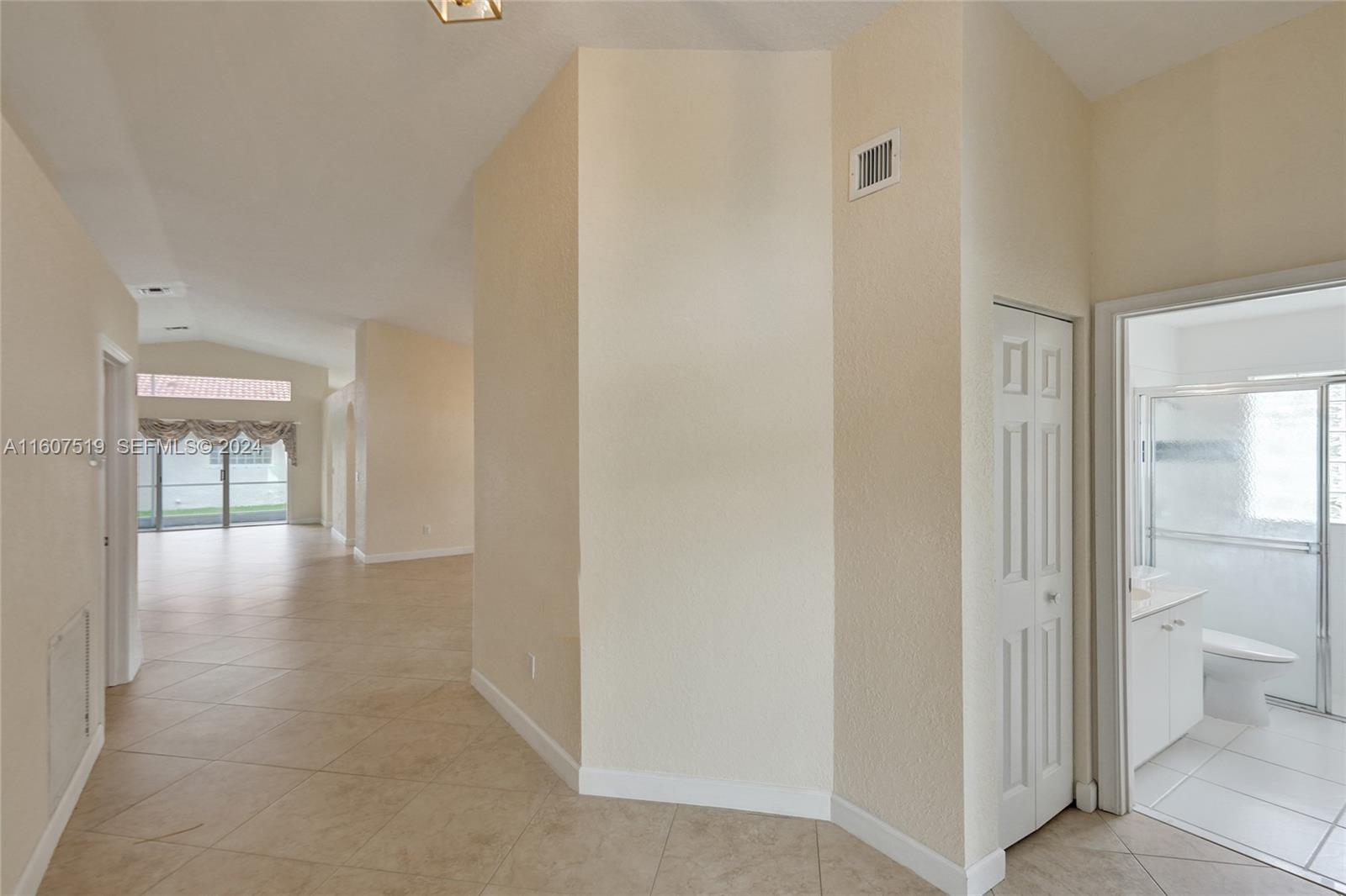 22740 Royal Crown Terrace East Boca Raton, FL 33433 - Photo 2 of 26 a view of an empty room and glass door