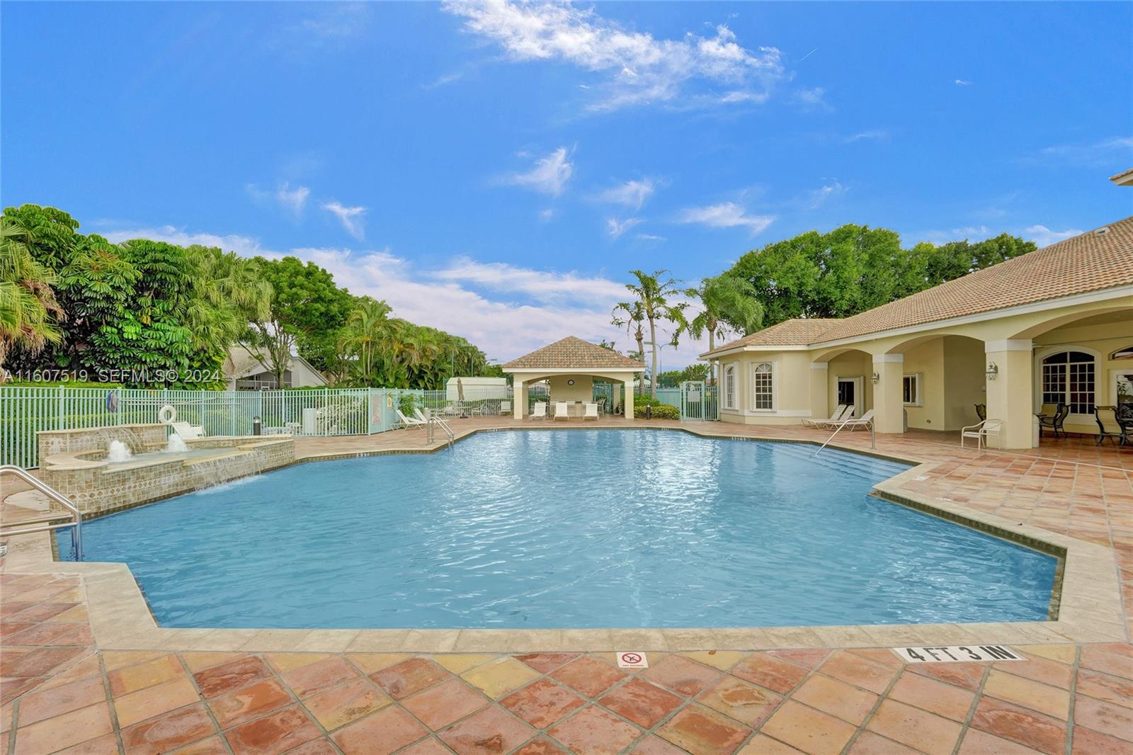 22740 Royal Crown Terrace East Boca Raton, FL 33433 - Photo 22 of 26 a view of a house with swimming pool