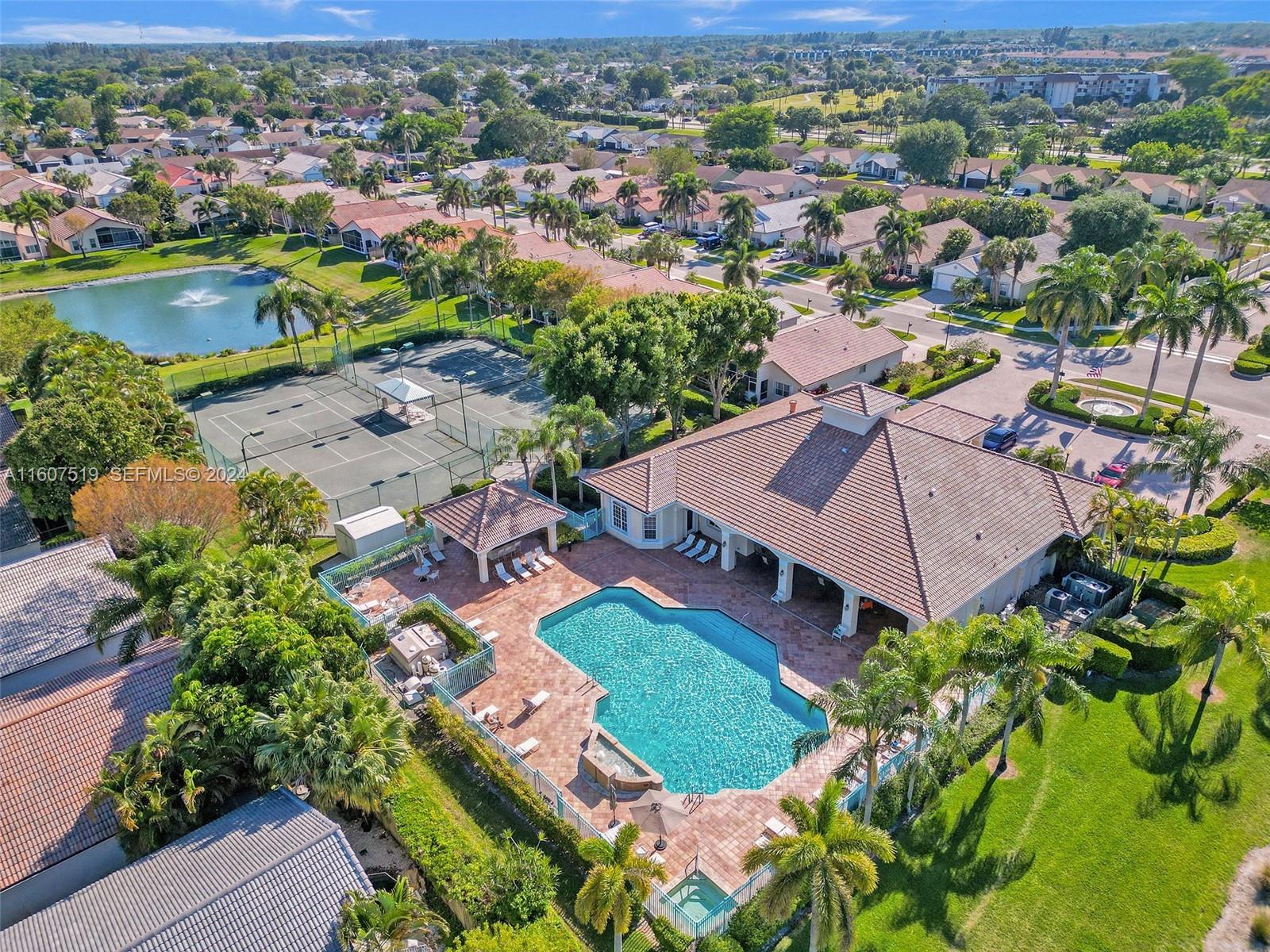 22740 Royal Crown Terrace East Boca Raton, FL 33433 - Photo 24 of 26 an aerial view of residential houses with outdoor space and river