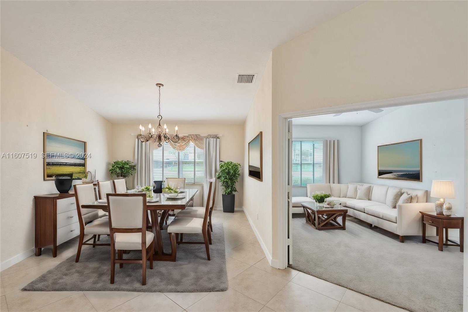 22740 Royal Crown Terrace East Boca Raton, FL 33433 - Photo 3 of 26 a view of a livingroom with furniture and window