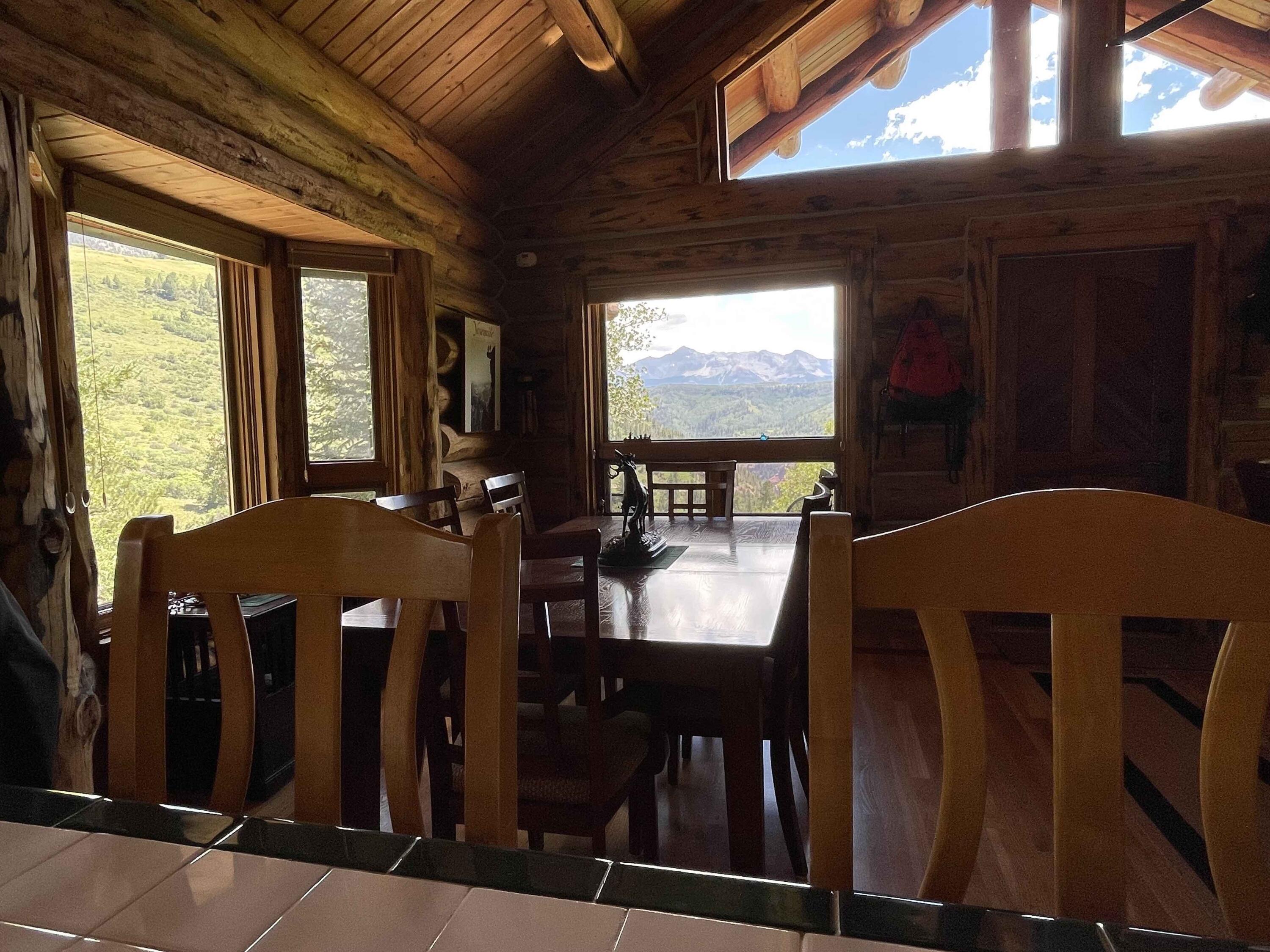 2001 58P Road Placerville, CO 81430 - Photo 14 of 34 a view of a dining room with furniture window and outside view