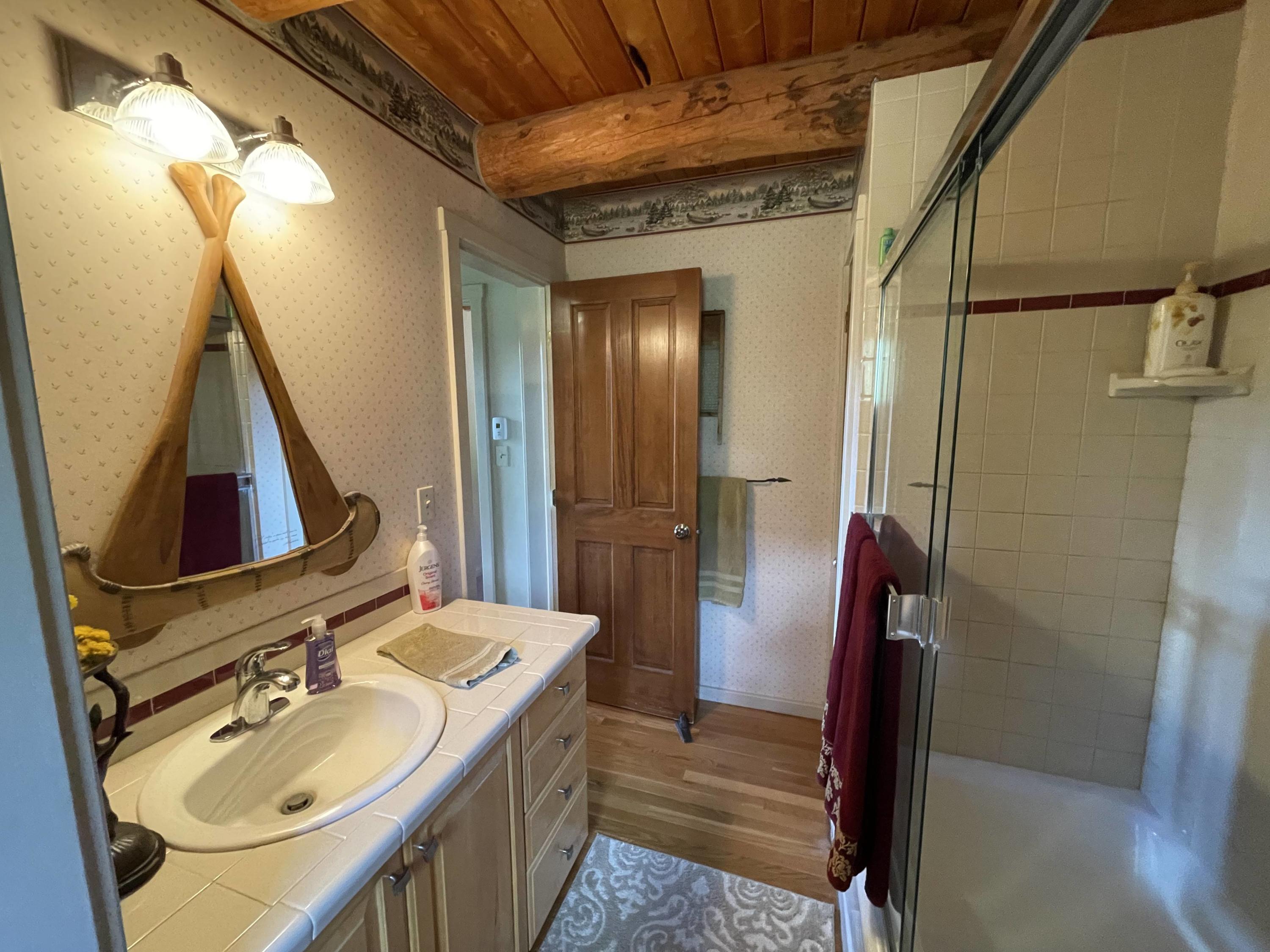 2001 58P Road Placerville, CO 81430 - Photo 21 of 34 a bathroom with a sink and a mirror
