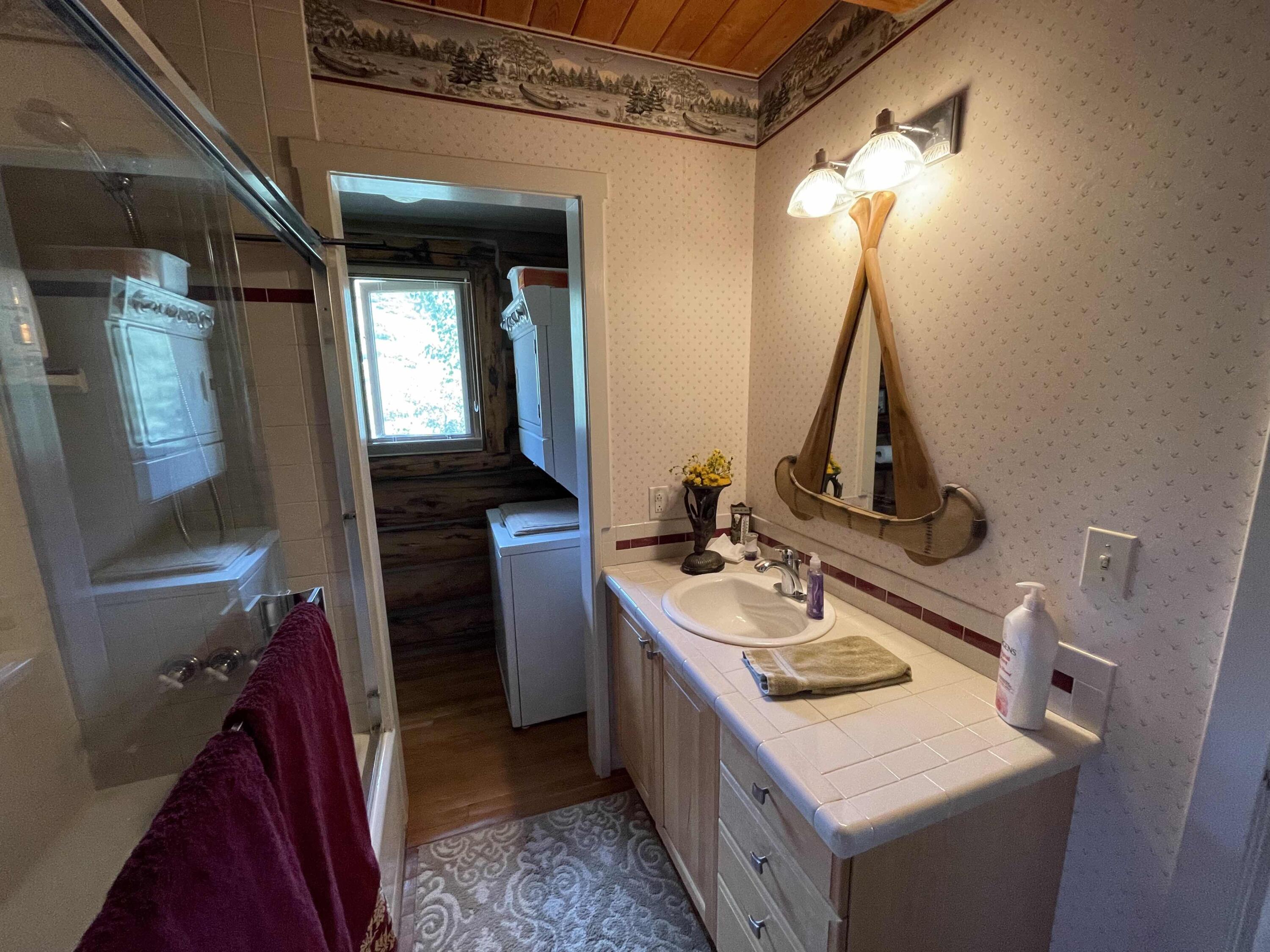 2001 58P Road Placerville, CO 81430 - Photo 22 of 34 a bathroom with a sink and a mirror