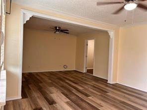 3601 Aloha Circle Mesquite, TX 75150 - Photo 7 of 22 a view of a room with wooden floor and closet