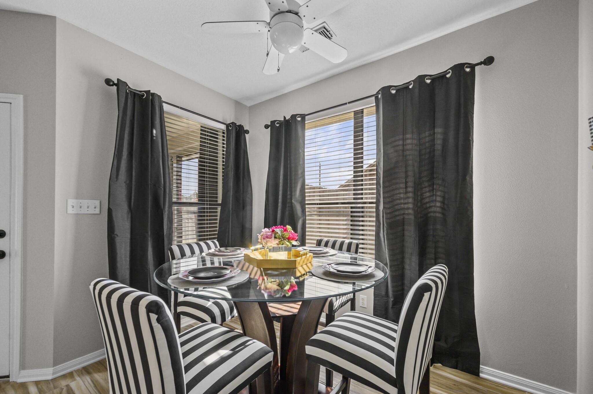 12302 Fisher Drive Mont Belvieu, TX 77523 - Photo 14 of 23 a view of a dining room with furniture and window